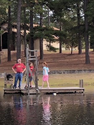 Ray and kids on the dock.
